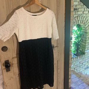 Sophisticated white and black lace covered dress